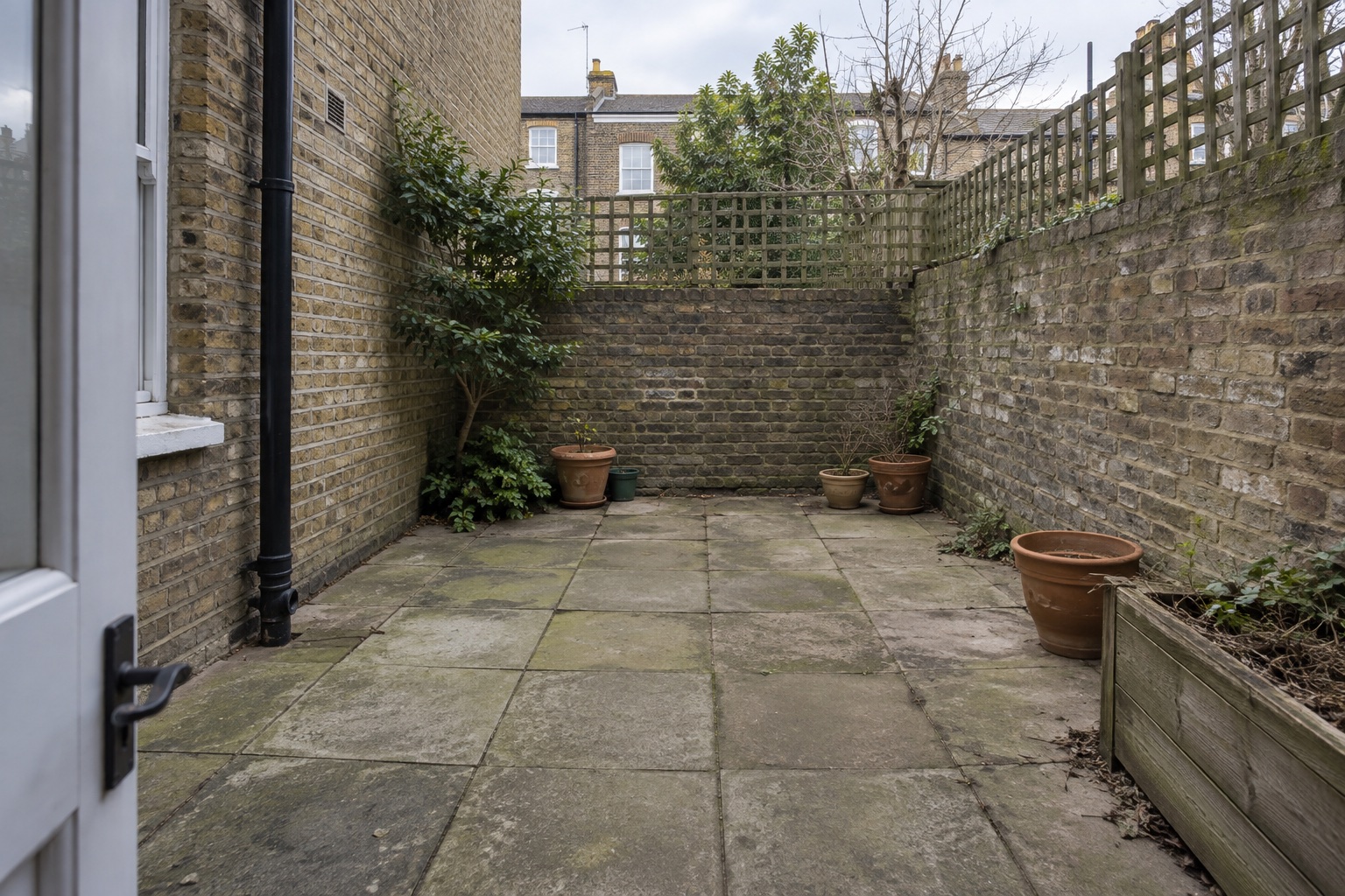AI-generated starting-point study of a compact London courtyard